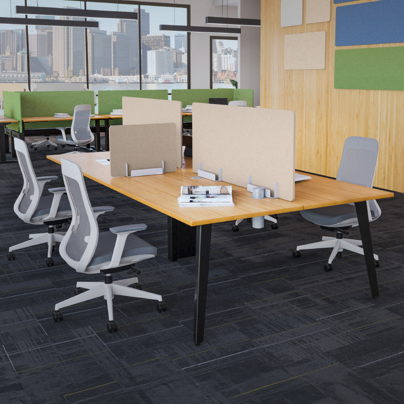 4-Person Table by UPLIFT Desk fitted with Acoustic Privacy Panels between seats.
