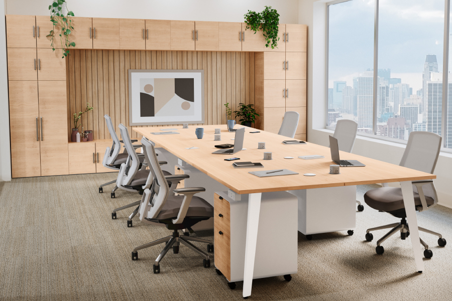Maple six-person meeting table with Mopac Cabinets in the background.