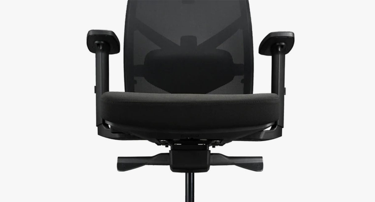 A black ergonomic chair shown with adjustment levers