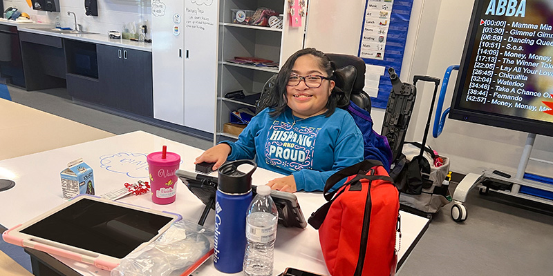 UPLIFT Desk height-adjustable desks in a classroom setting at Rosedale School, supporting students with disabilities.