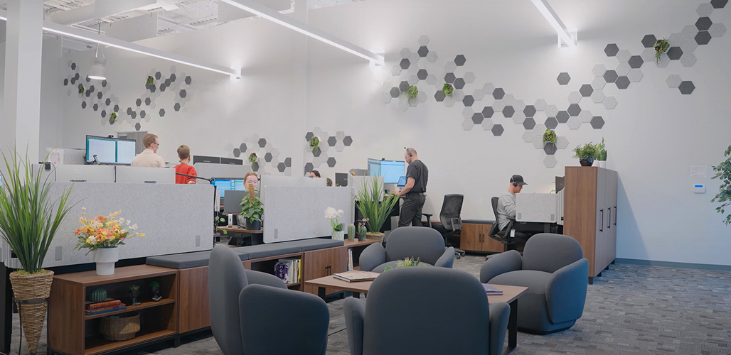 Modern office with Standing Desks, Mopac Storage, Acoustic Panels, and Dillo Lounge Seating by UPLIFT Desk