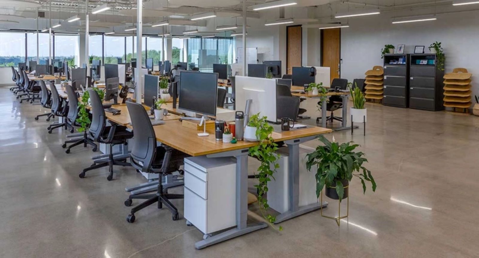 Office designed by UPLIFT Desk featuring ergonomic furniture configured from optimal space planning
