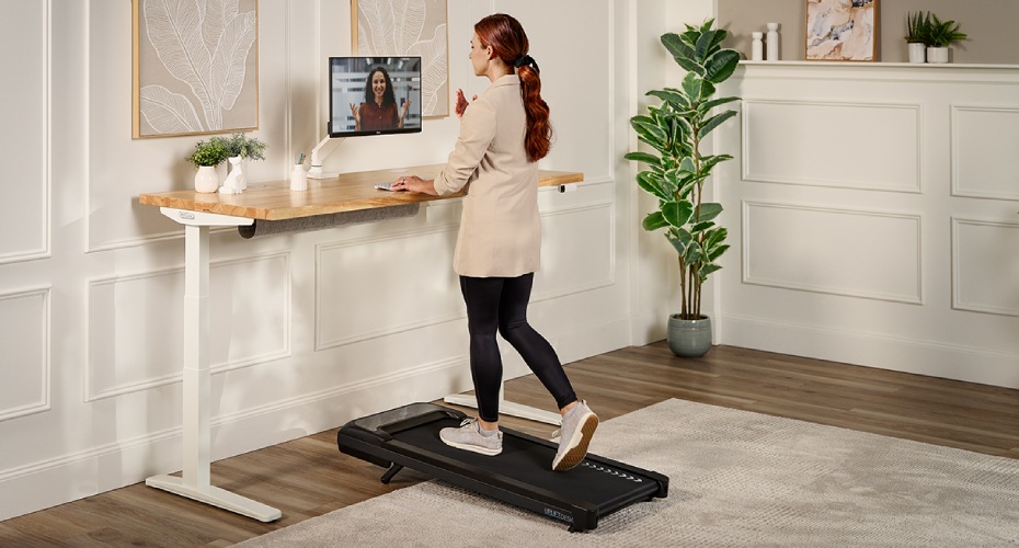 Walking pad paired with UPLIFT standing desk for an active workspace