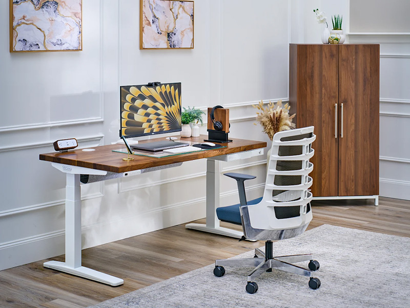 UPLIFT 2-leg standing desk in home office setting