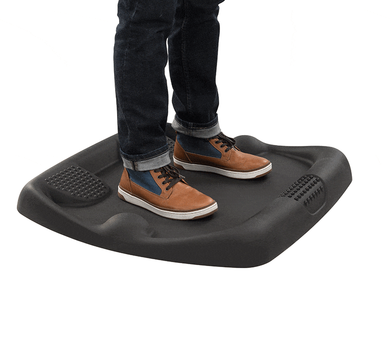 Anti-fatigue mat encouraging micro-movements while standing at desk