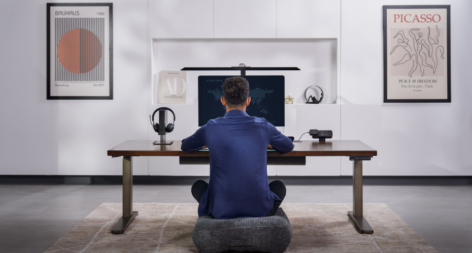 Ergonomic workspace setup that supports better sleep through reduced chronic pain