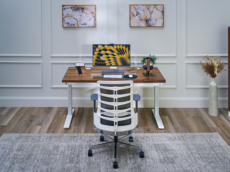 Ergonomic standing desk workspace designed to reduce chronic pain and support better sleep