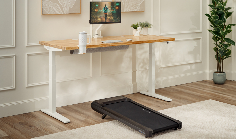 UPLIFT walking pad beneath a standing desk for low-intensity walking work