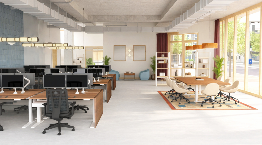 An open-plan office furnished with UPLIFT Desk standing desks, acoustic privacy screens, and modular storage