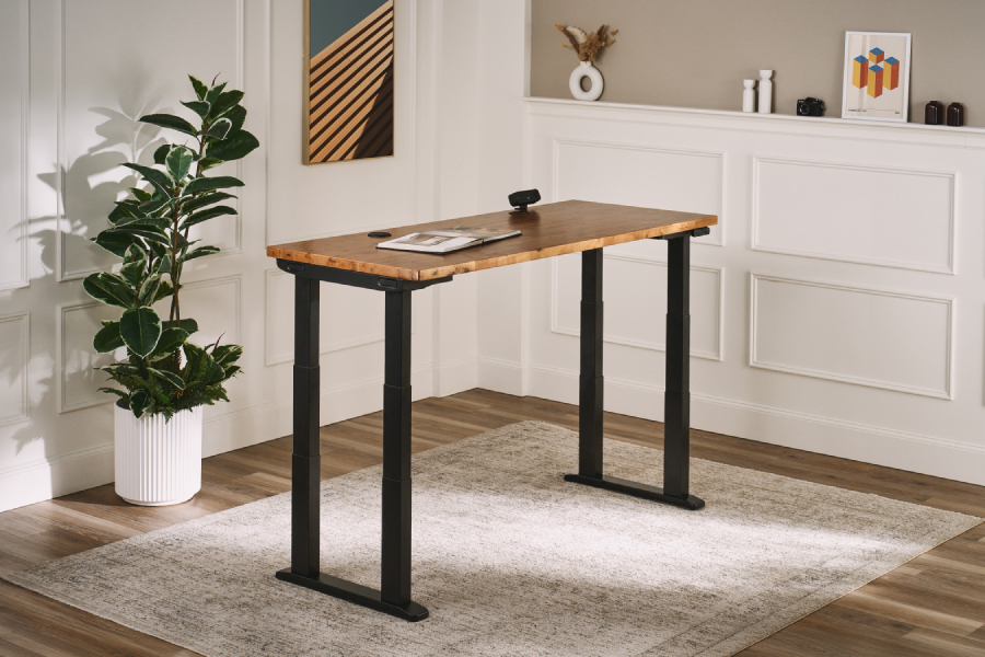 The UPLIFT 4-Leg Standing Desk shown with its V3 frame and desktop