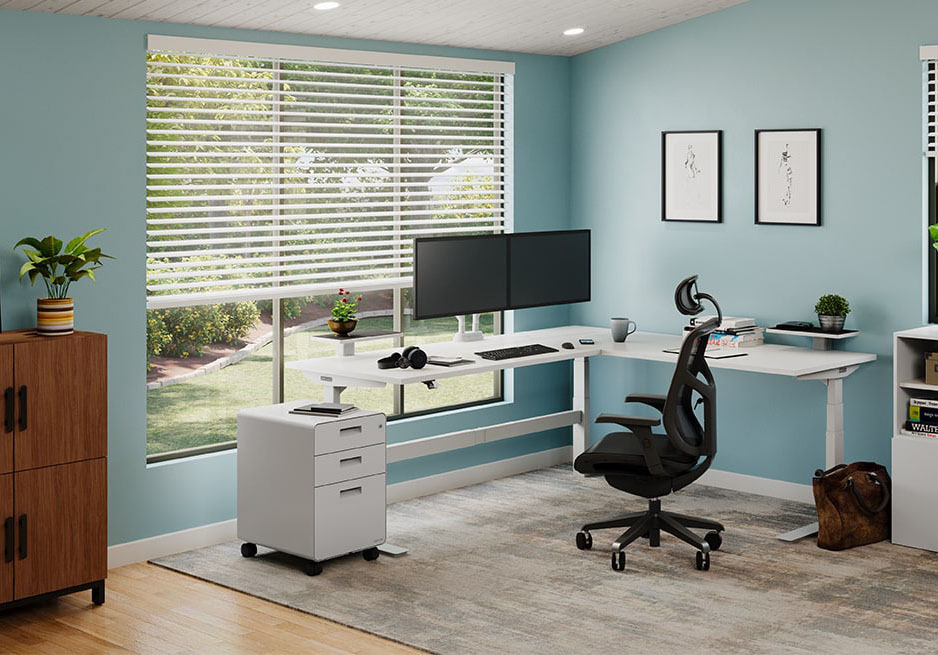 A 72 in M x 60 in R White Laminate L-Shaped UPLIFT Standing Desk in a home office