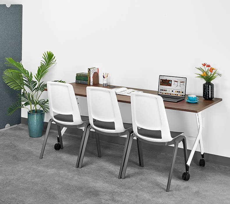 A Walnut Laminate Flip Top Table with Flex Chairs