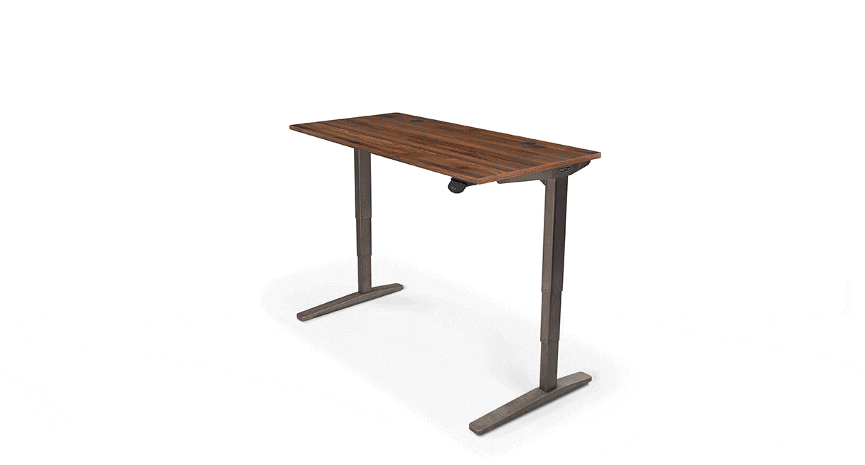 A gif of a 2-Leg UPLIFT standing desk with configured ergonomic desk accessories 