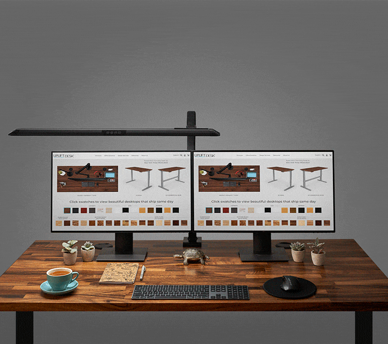 Animation of the sliding flex lamp shifting side to side above two monitors