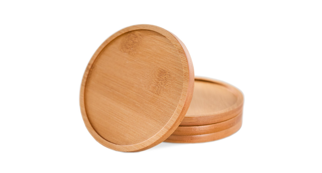 Bamboo Coasters are available in natural or stained black bamboo colors, and sold in sets of four matching colors