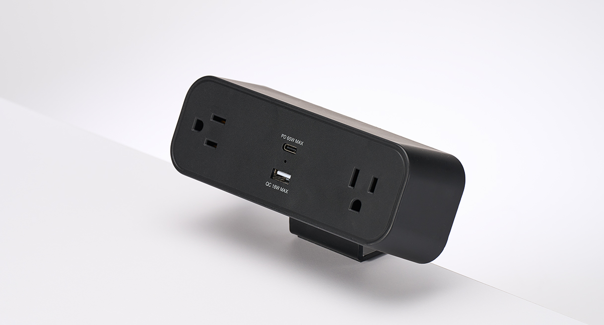 Mount the DuoMount Power Strip's mount below or above desks for easy access to additional power and charging