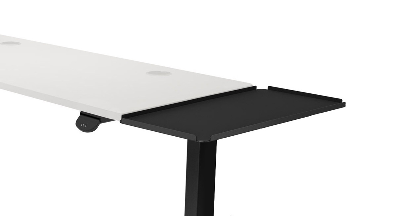 The Desk Extension attaches to the patented mounting points on UPLIFT Standing Desk Frames in minutes
